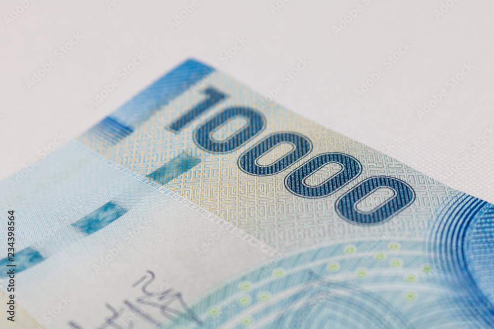 Obraz premium Chilean money notes. Chile ten thousand (10000) pesos. Selective focus.