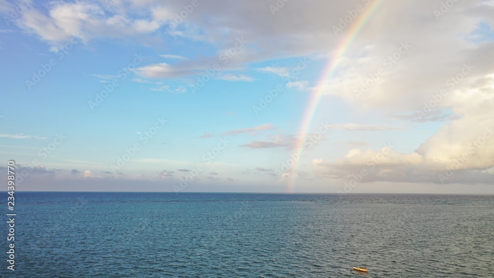 Amazing rainbow over the ocean, caribbean sea, Jamaica