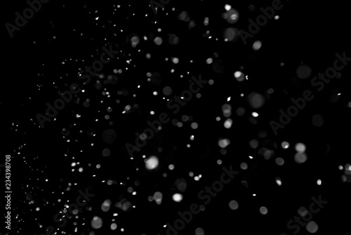 Falling Snow down On The Black Background