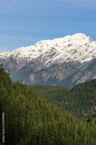 Mountain peak in snow with clear sky north of USA.