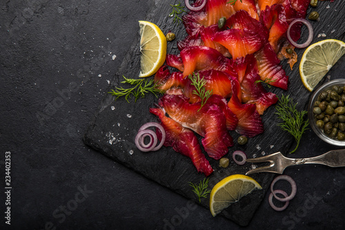 Canvas Print sliced Gravlax,  scandinavian beet cured salmon  served with red onion, capers a