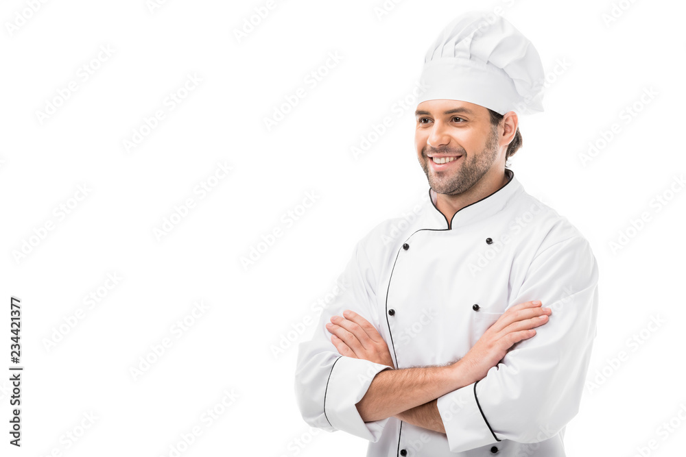 handsome young chef with crossed arms looking away isolated on white handsome young chef with crossed arms looking away isolated on white
