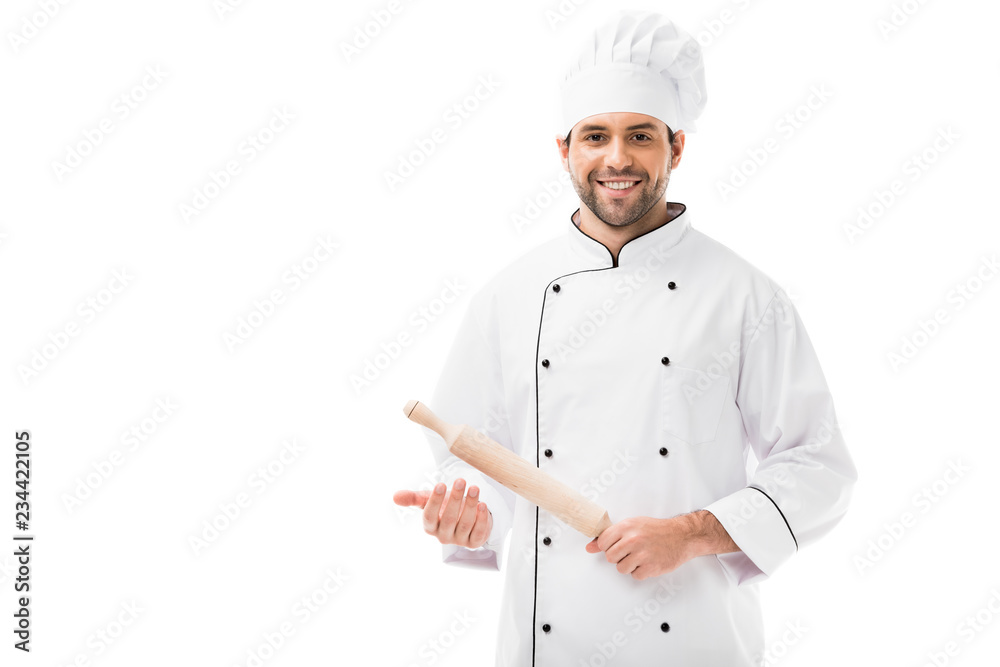 smiling young chef holding rolling pin and looking at camera isolated on white smiling young chef holding rolling pin and looking at camera isolated on white