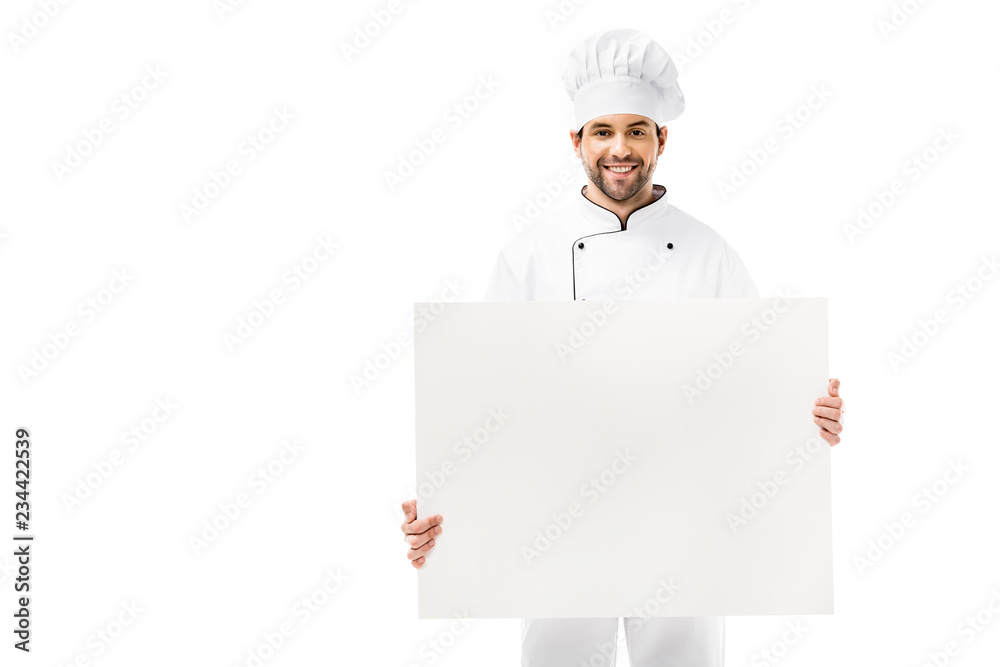 handsome young male chef holding blank banner and smiling at camera isolated on white handsome young male chef holding blank banner and smiling at camera isolated on white