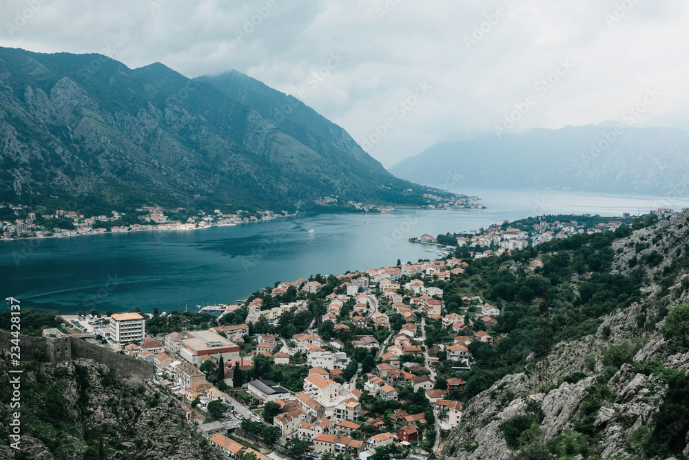 Aerial view of Kotor - a city on the Adriatic coast in Montenegro. One of the most beautiful coastal cities of Montenegro. Near a beautiful mountain landscape.