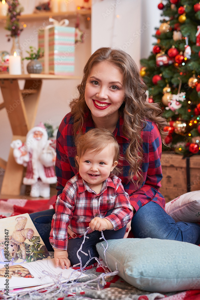 Christmas family Mom and daughter. Merry Christmas and Happy Holidays card! Morning before Xmas background. Portrait loving family. Family preparation holiday food. Happy New Year! Christmas baby Christmas family Mom and daughter. Merry Christmas and Happy Holidays card! Morning before Xmas background. Portrait loving family. Family preparation holiday food. Happy New Year! Christmas baby