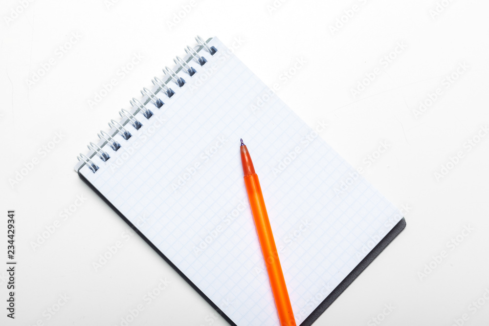 notepad notebook and ball pont pen isolated on white background notepad notebook and ball pont pen isolated on white background
