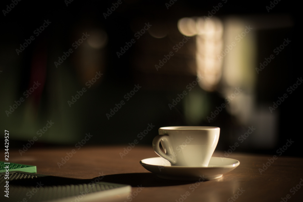 Obraz premium Color image of some steam coming out of a coffee cup.