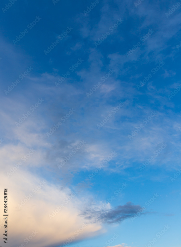 Fototapeta premium Clouds after rain before sunset as a background