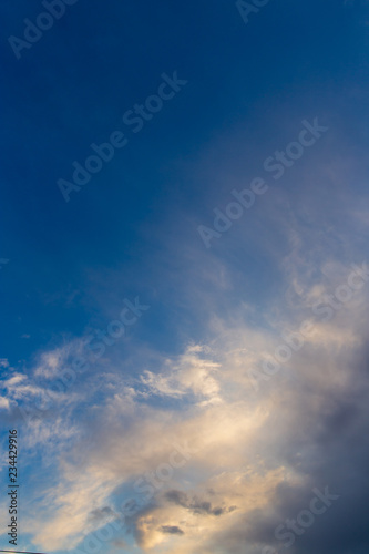 Clouds after rain before sunset as a background © schankz