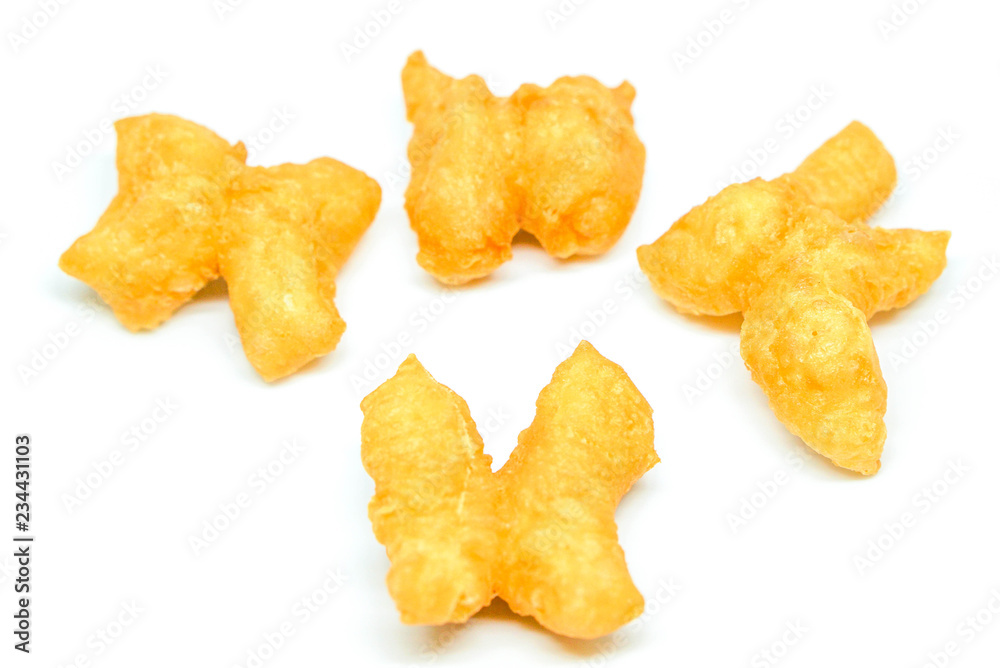 Deep-fried dough sticks or it is called in Thai and Chinese “Patongko” isolated on white background Deep-fried dough sticks or it is called in Thai and Chinese “Patongko” isolated on white background