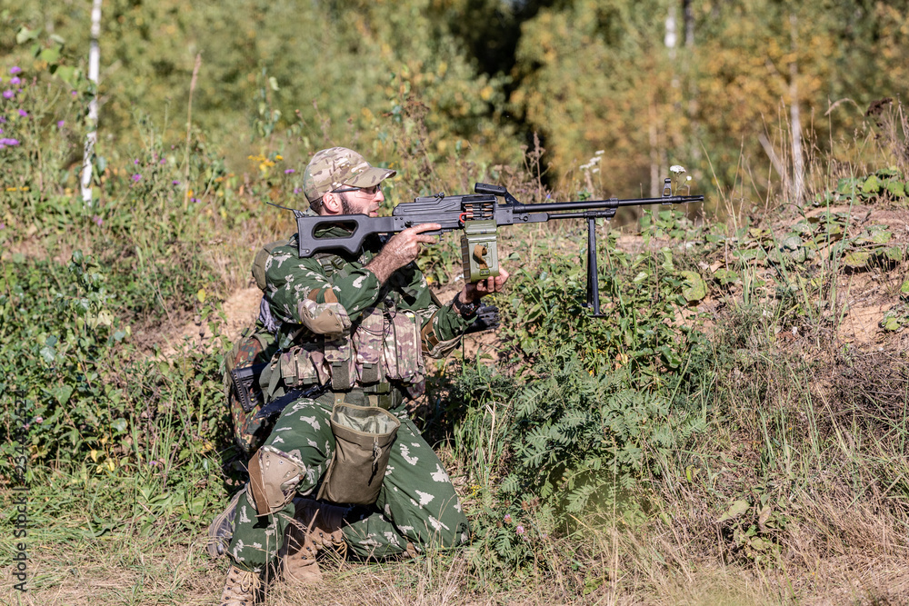 special forces, soldier assault rifle with silencer, optical sight ...