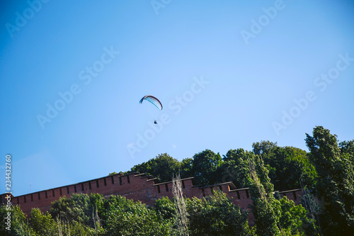 Flight on a hang-glider over the city photo