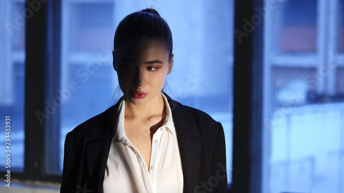 Soft focus portrait of pretty girl in dark room highlighted with spotlight Free Download Soft focus portrait of pretty girl in dark room highlighted with spotlight - GFXLoad