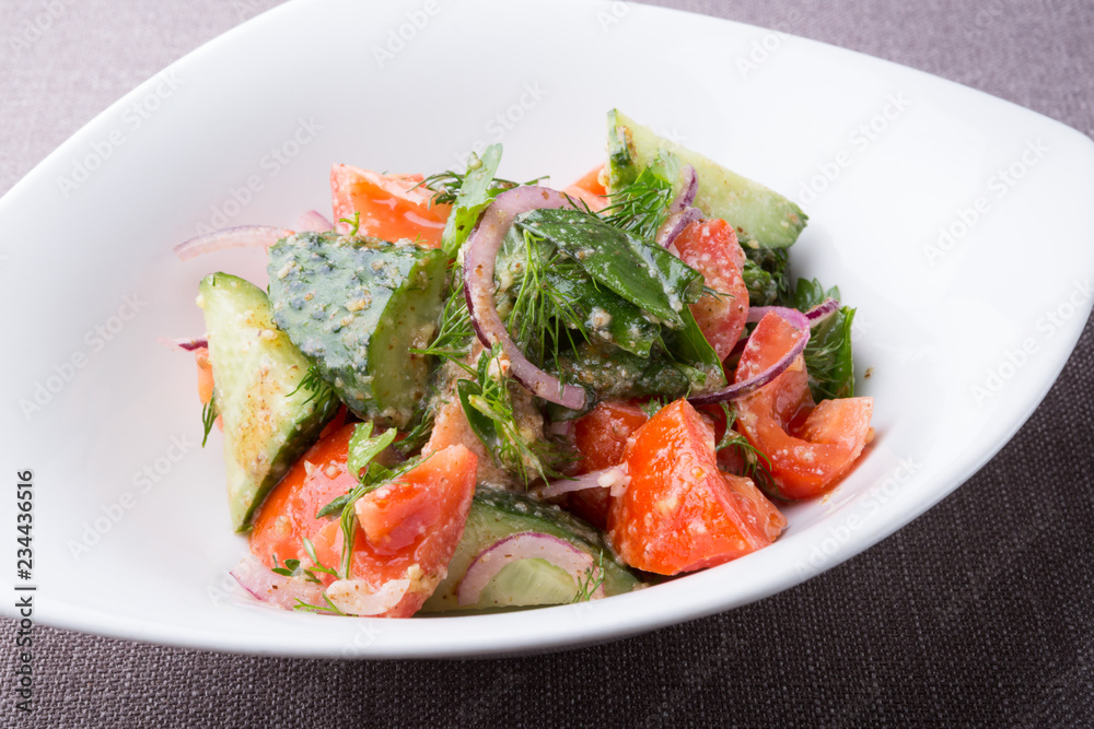 Fresh raw tomato and cucumber mixed salad