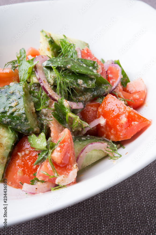 Fresh raw tomato and cucumber mixed salad Fresh raw tomato and cucumber mixed salad