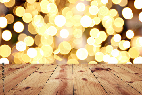 Brown old wooden floor on Christmas bokeh backdrop and have copy space.