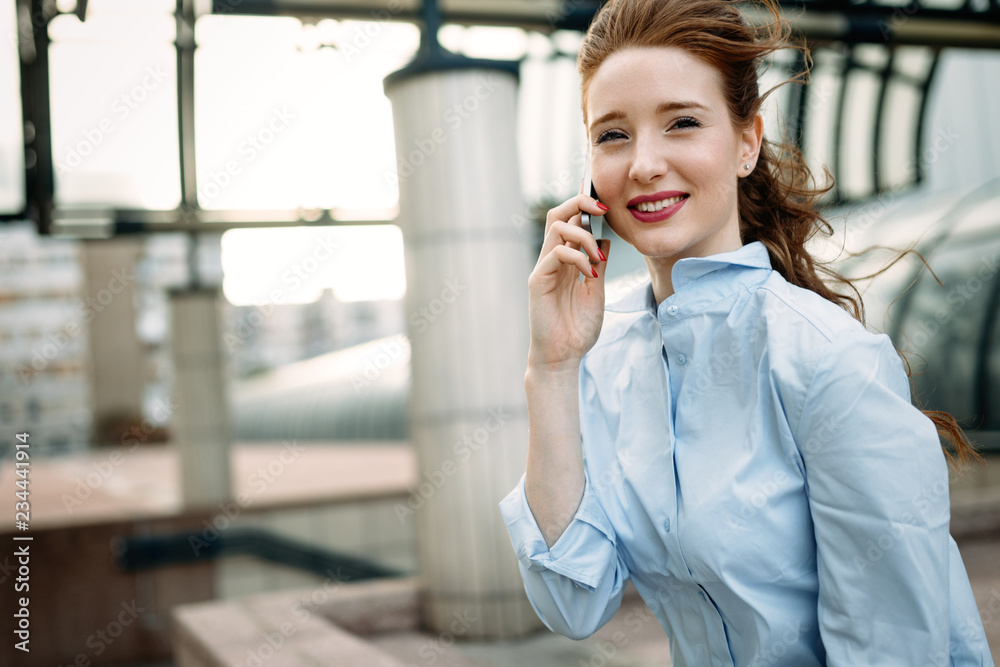 Portrait of a successful business woman smiling Portrait of a successful business woman smiling