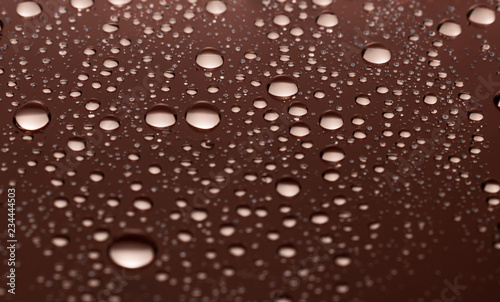 Water drops on a red background