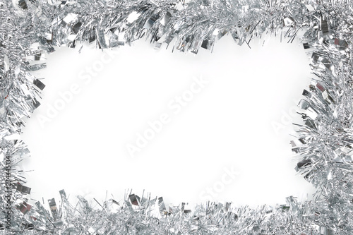 Silver tassel of Christmas on white background. photo
