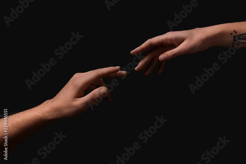 Male and female hands reach...
