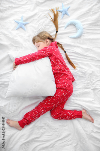 Cute little girl sleeping i...
