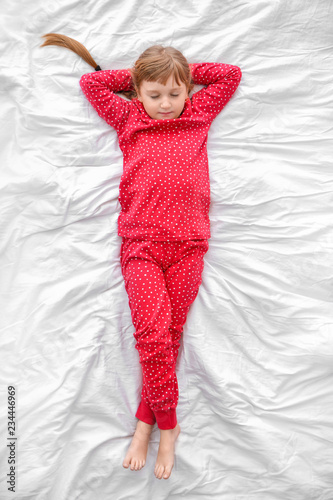 Cute little girl sleeping i...