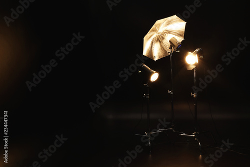 Fotografia Professional lighting equipment on dark background