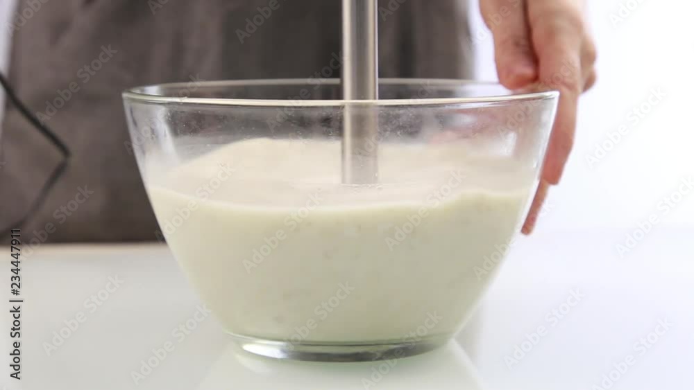 preparing of organic milk. Stirring in a blender. Healthy concepte preparing of organic milk. Stirring in a blender. Healthy concepte