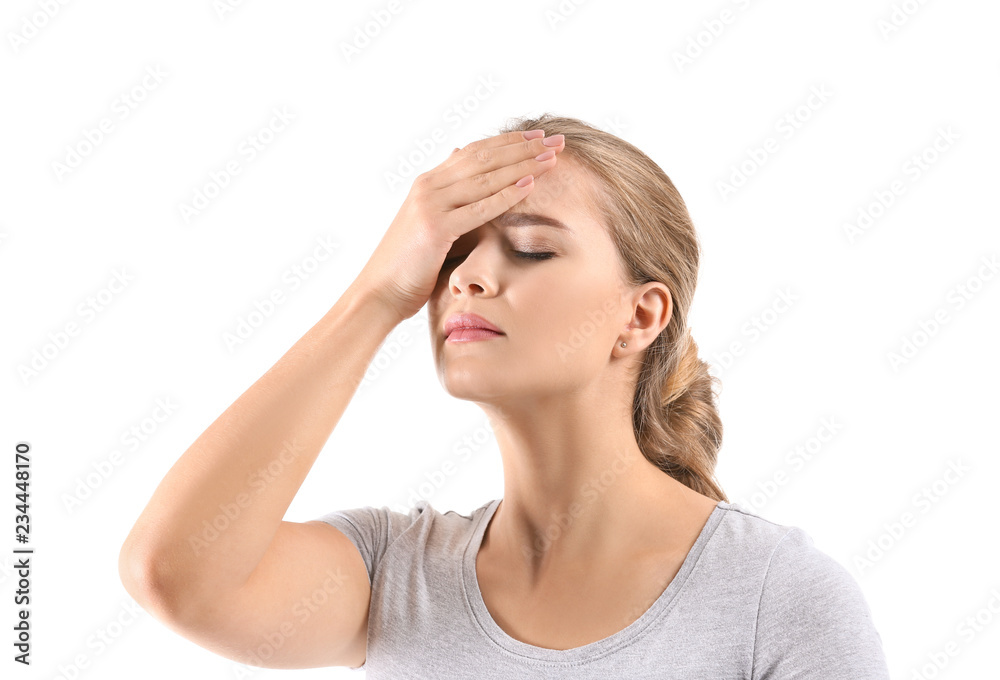 Young woman suffering from headache on white background Young woman suffering from headache on white background