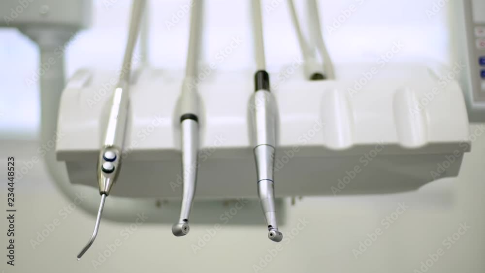 Closeup of dental drills in dentists office. Backlight. Closeup of dental drills in dentists office. Backlight.