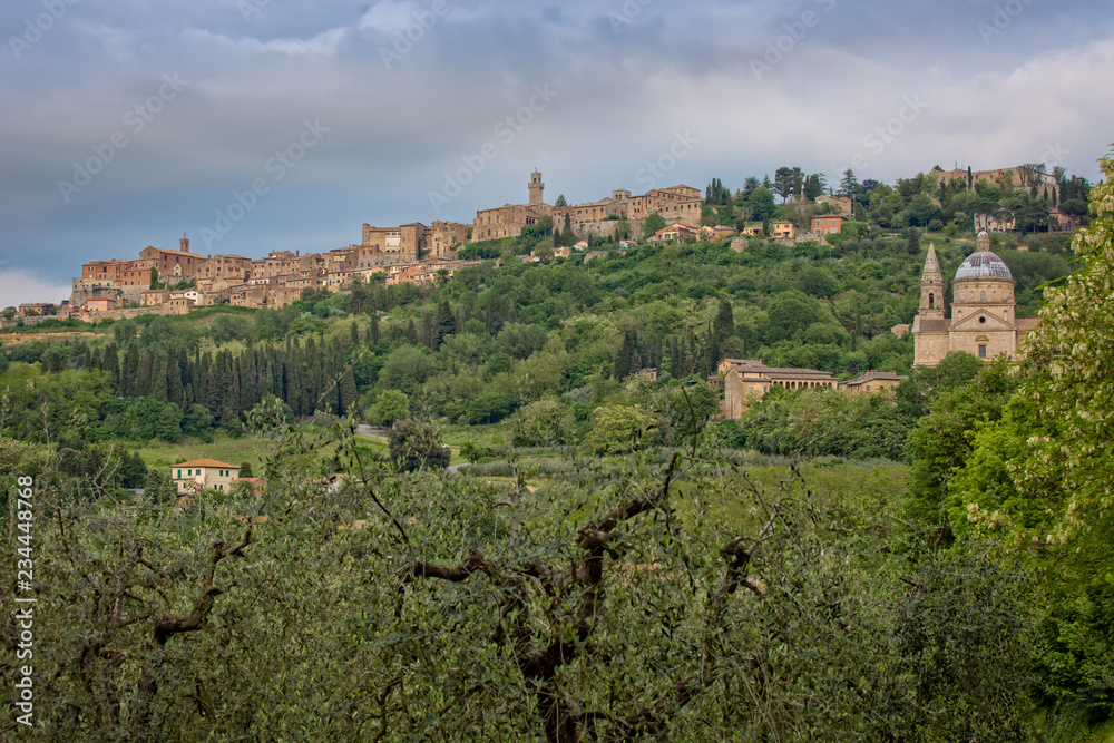 The medieval village of Montepulciano. View of the church Madonna di San Biagio and of the hilltop town of Montepulciano in Tuscany, Italy