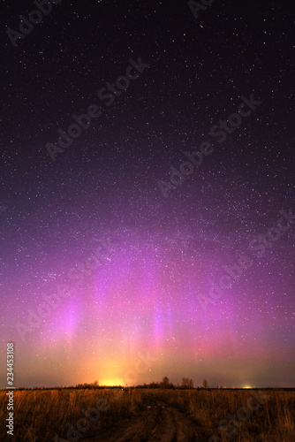 Night landscape with northern lights. Aurora borealis