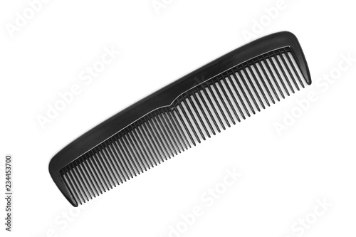 black plastic comb isolated on white