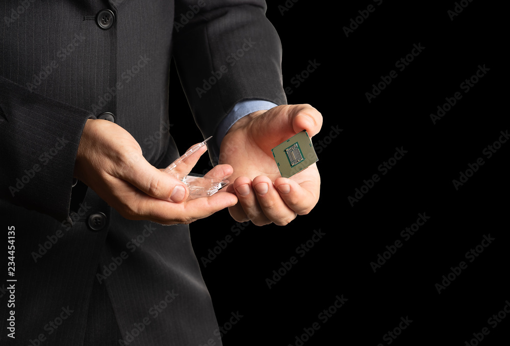 CPU device in the hands, isolated on a black