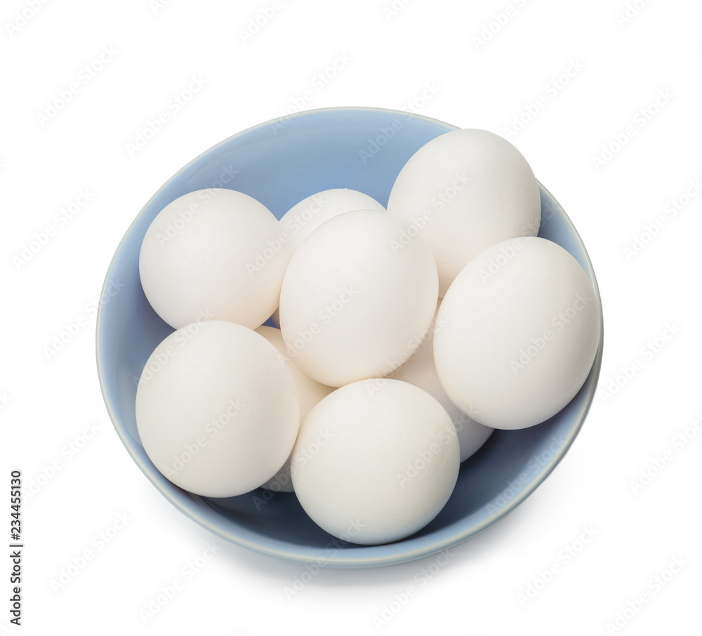 Bowl with raw chicken eggs on white background Bowl with raw chicken eggs on white background