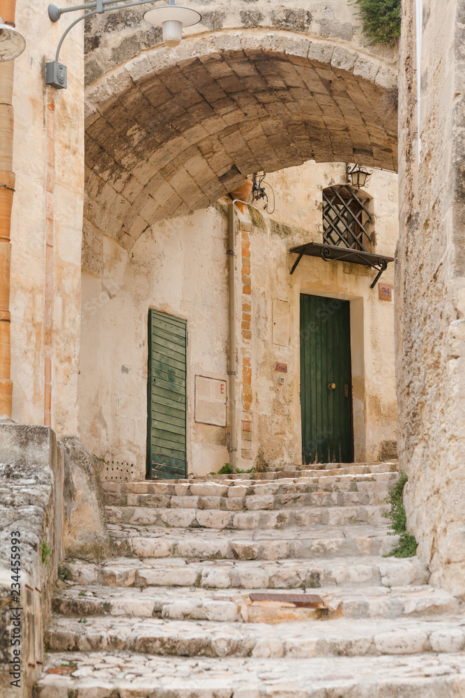 Ancient town of Matera (Sassi di Matera), European Capital of Culture 2019, Basilicata, Southern Italy. Narrow street