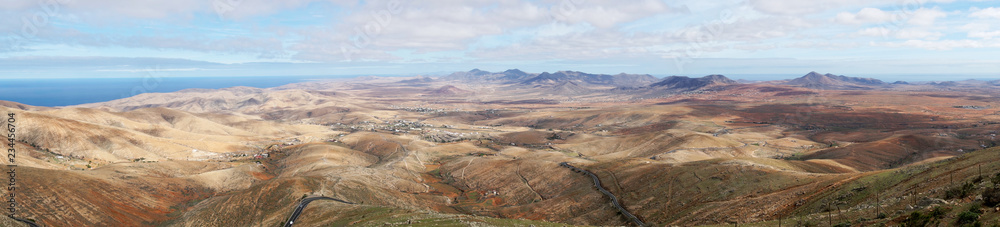 Beautiful panorama of volcanic mountains from the viewpoint Mirador Morro Velosa in Fuerteventura, Canary Islands