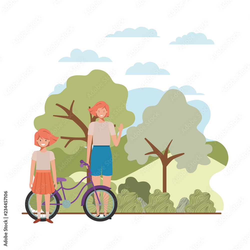 mother and daughter with bicycle in landscape