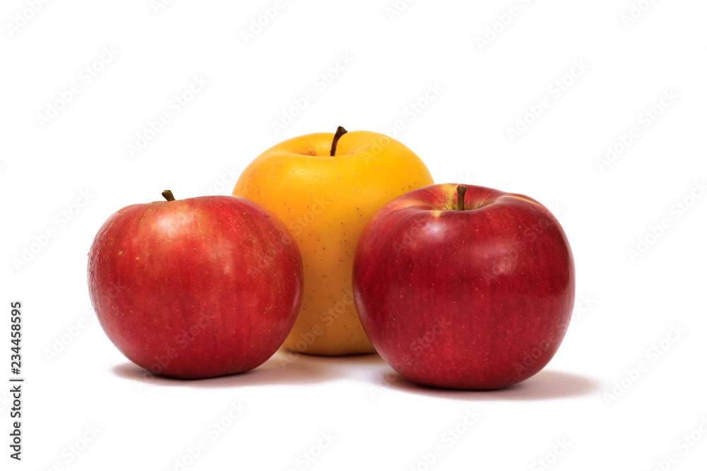 Three ripe apples on a white isolated background. Three ripe apples on a white isolated background.