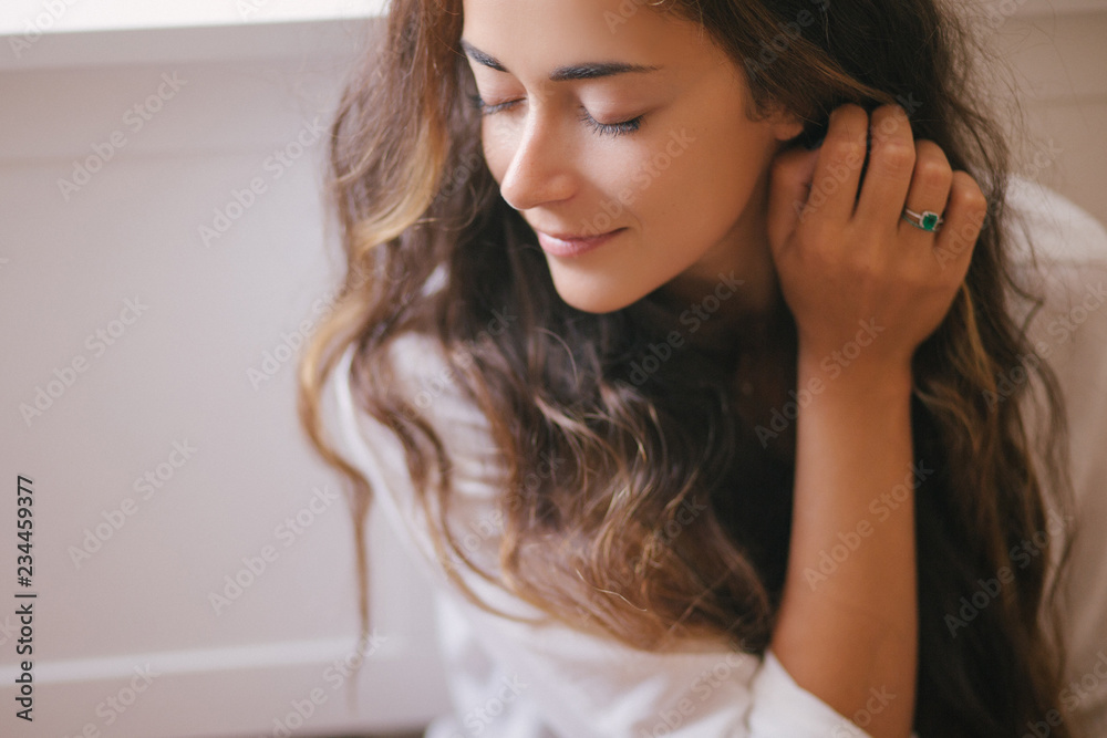 Young beautiful woman enjoying her morning tea at home Young beautiful woman enjoying her morning tea at home