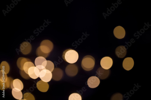 Gold abstract bokeh background, Festive and celebration background © ink drop
