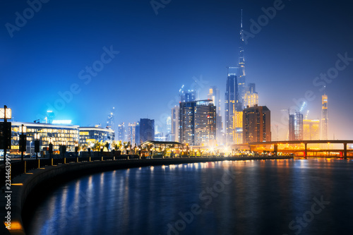 Beautiful view to Dubai downtown city center skyline from Design District at night, United Arab Emirates photo