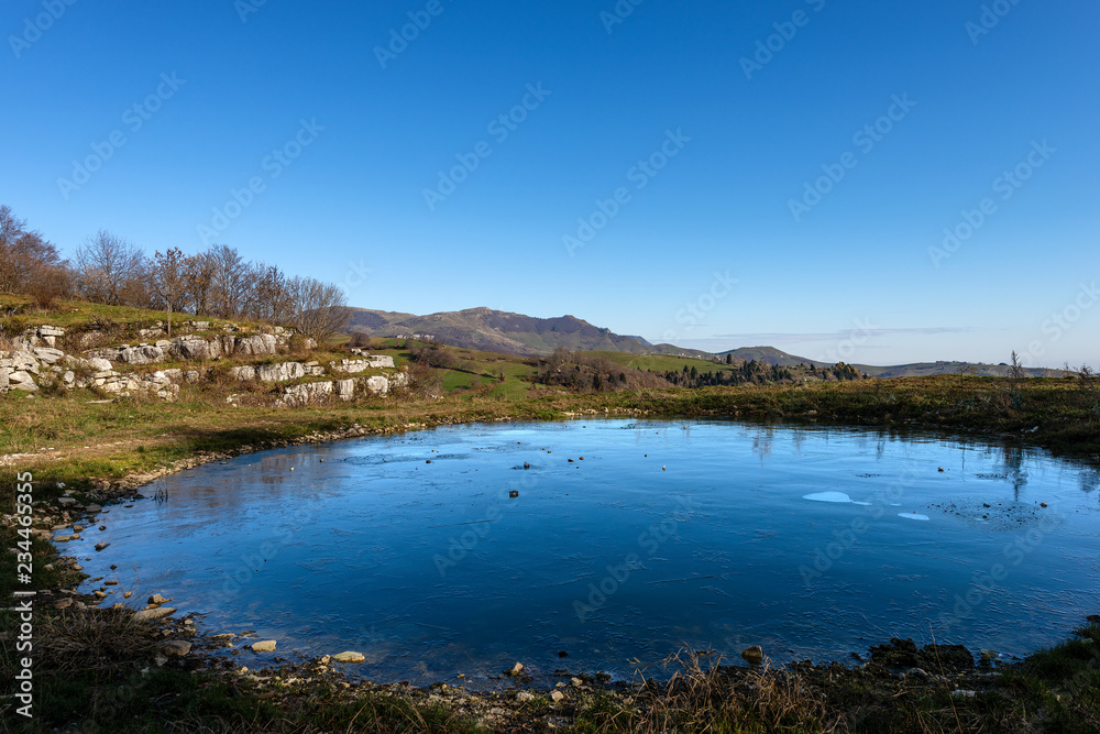 Alpine Frozen Pond - Plateau of Lessinia Italy