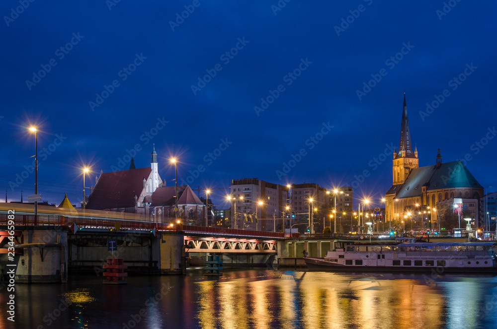 CITYSCAPE - Szczecin by night on banks of the river