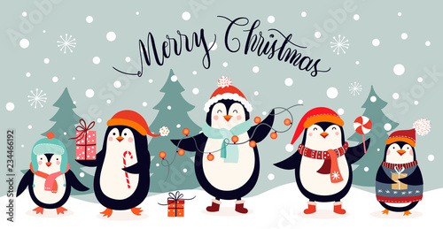 Christmas card design with cute penguins on an winter landscape