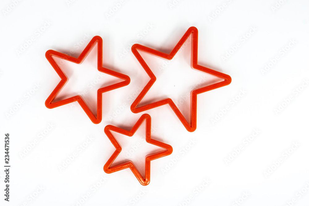 Cookie cutter star shape on white background