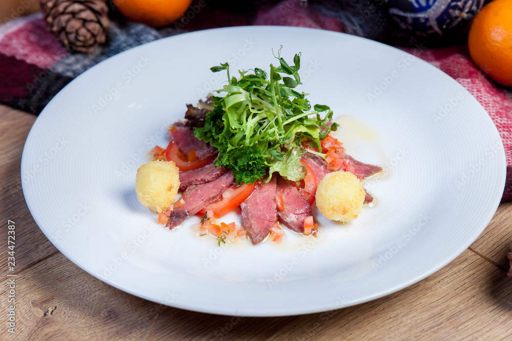Meat sliced. cold boiled pork, red meat, New Year's menu Meat sliced. cold boiled pork, red meat, New Year's menu