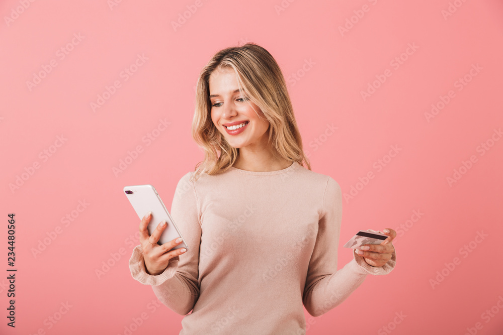 Portrait of a happy young woman wearing sweater Portrait of a happy young woman wearing sweater