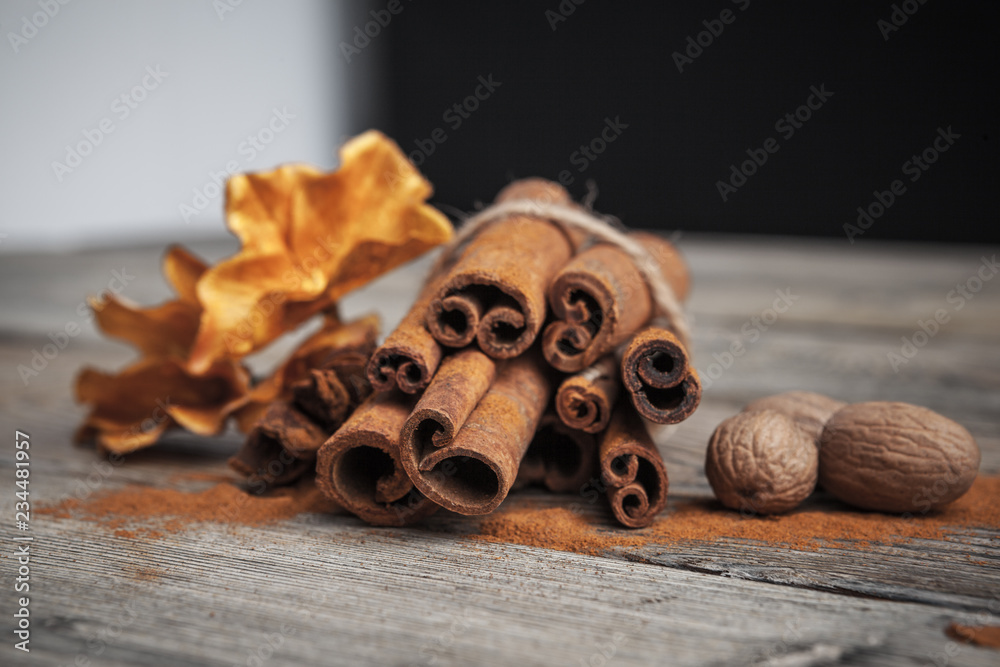 Cinnamon sticks on wooden background. Cinnamon sticks on wooden background.